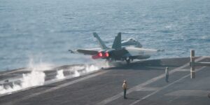 A US Navy carrier strike group locked in a Red Sea battle has fired over 500 munitions fighting the Houthis