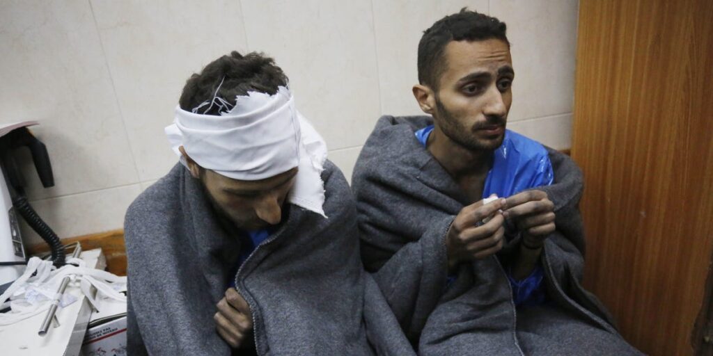 Israeli guards strapped wounded Palestinian detainees to their beds wearing diapers and fed them through straws, report says