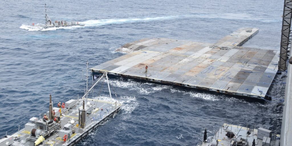 US soldiers were stranded on beached Army boats after a storm broke apart the US-built aid pier in Gaza