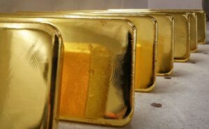 Gold prices close to record highs; copper down as China stimulus disappoints By Investing.com