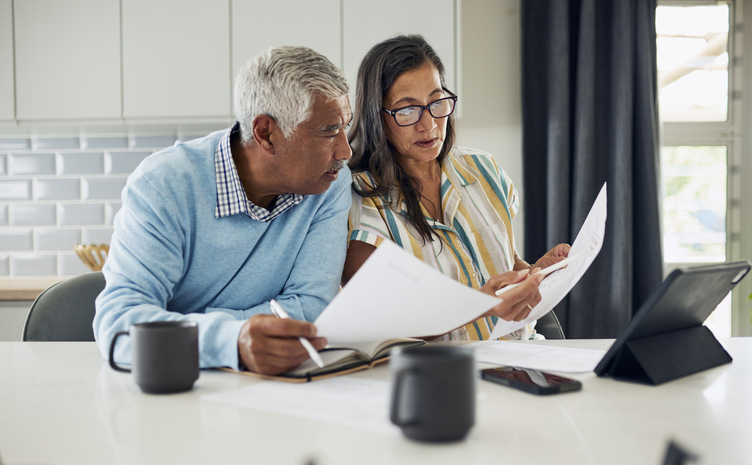 A couple choosing investments for their Roth IRA.