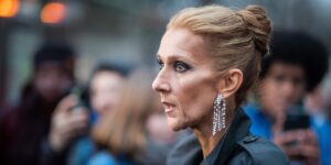 Céline Dion says that almost anything — even happiness — can trigger the symptoms of her stiff-person syndrome