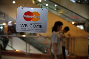 US judge rejects Visa, Mastercard  billion swipe fee settlement By Reuters