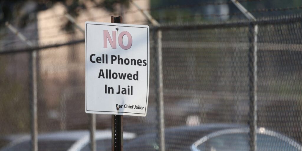 An FCC ruling has cut prison phone bills in half, disrupting the correctional telecommunications industry