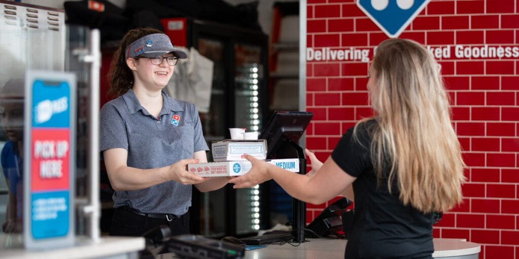 Domino’s CEO says customers are picking up their own pizzas, and it reveals a bleak reality about the economy