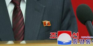 North Koreans have a new fashion accessory — Kim Jong Un lapel pins. Here’s what they mean for the supreme leader’s legacy.