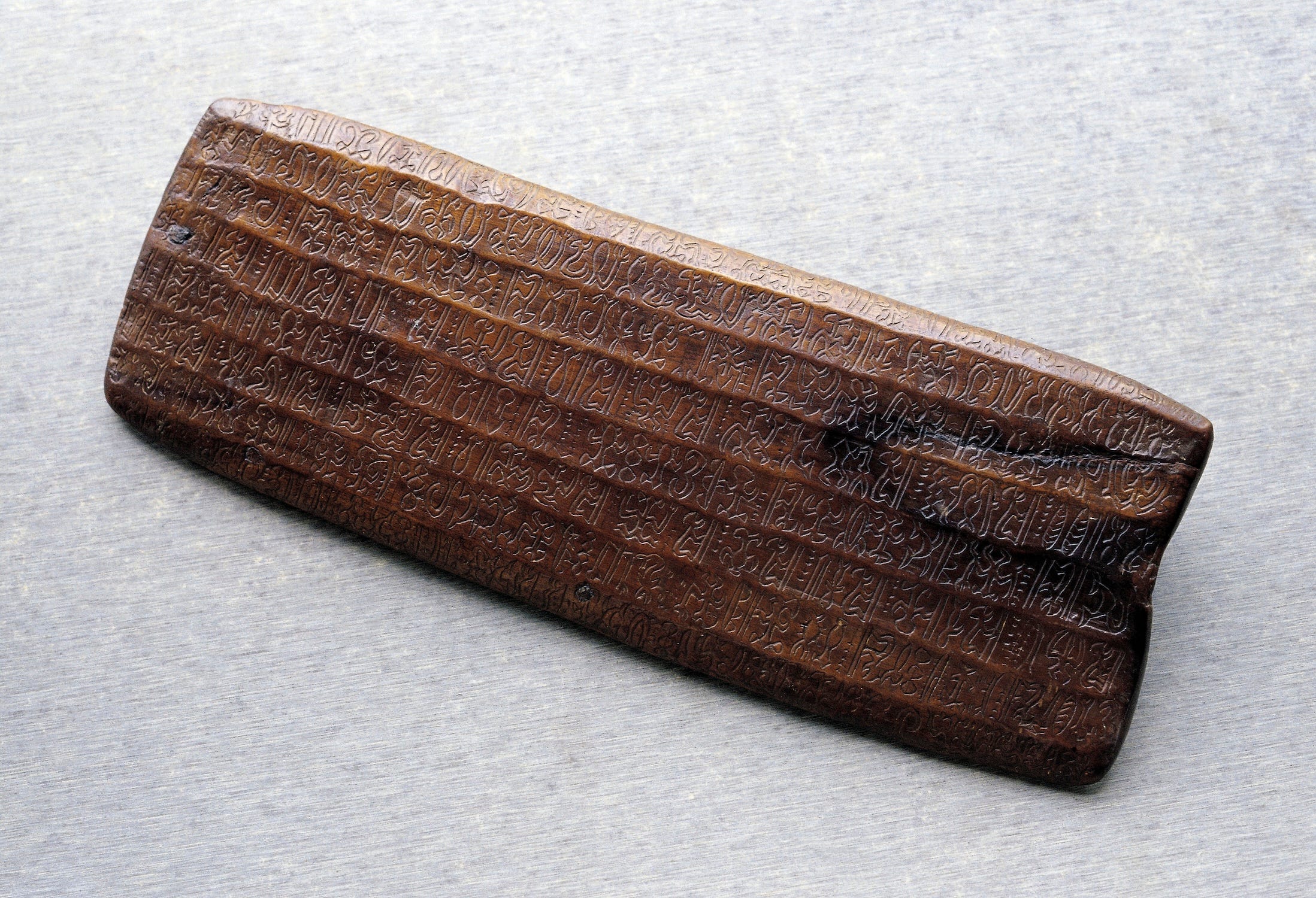 A wooden tablet covered in rongorongo script