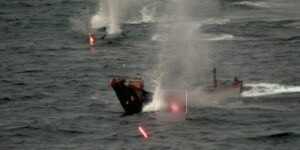 New military photo captures a NATO warship taking out an explosive-packed drone boat during a Red Sea rescue mission