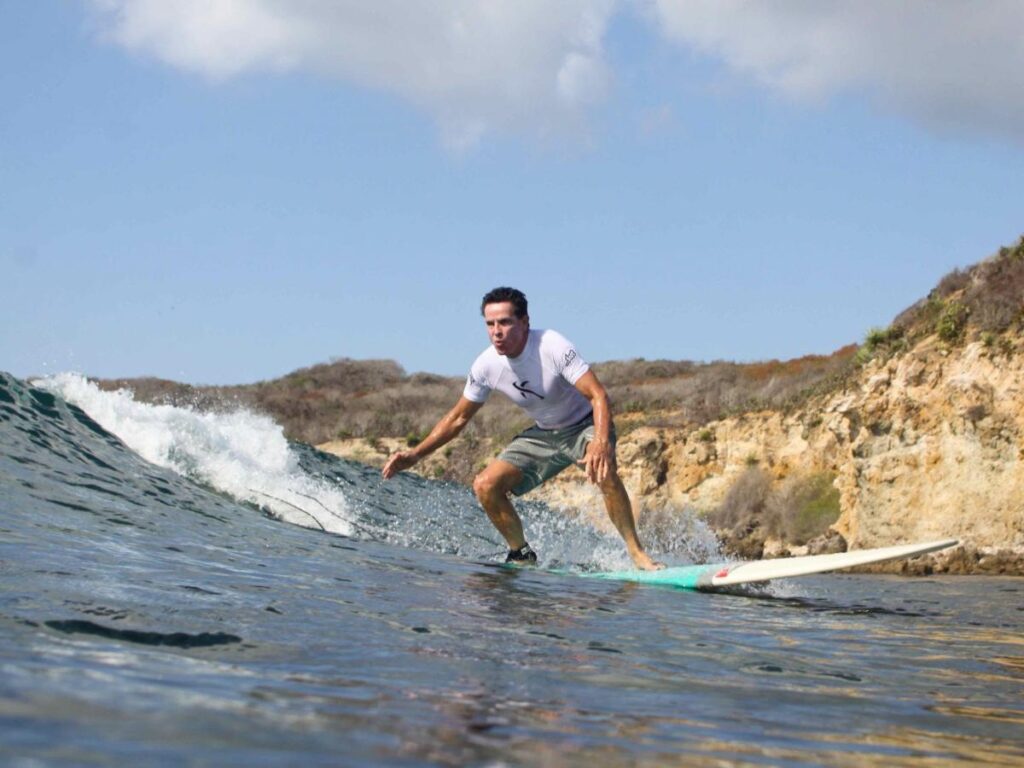 A surfer without a degree is worth  billion after his biotech company’s stock soared 1,100% in a year