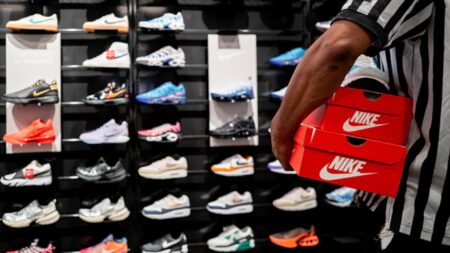 Nike postpones investor day, posts mixed quarterly results as it gears up for CEO change