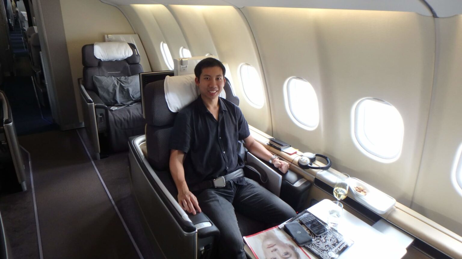 He flies business and first class — all on credit card points