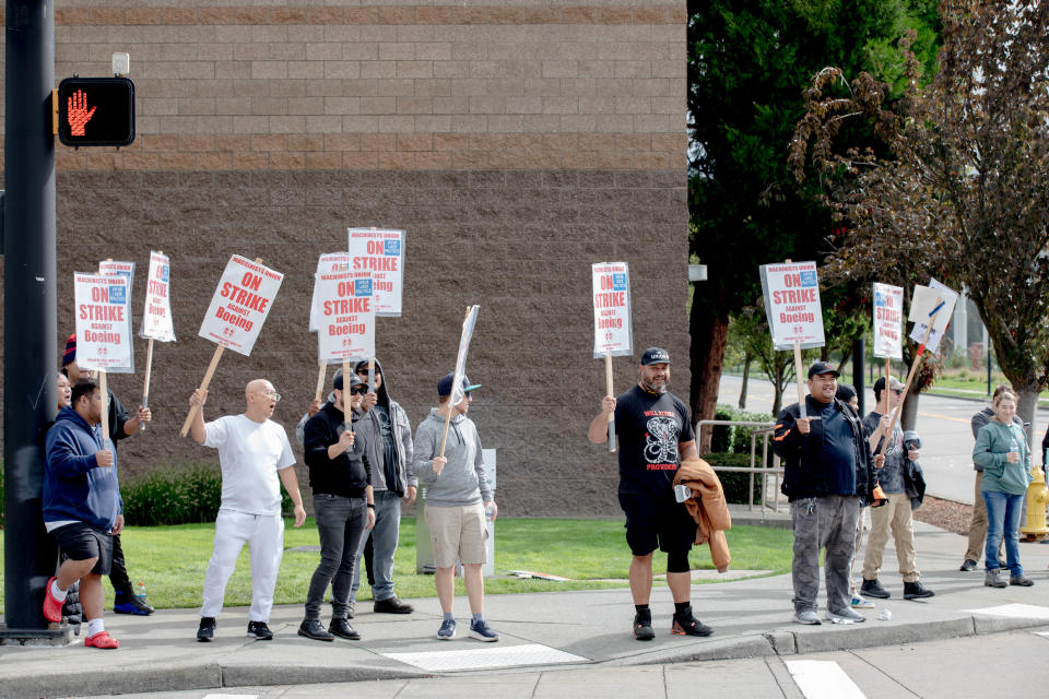 Striking Boeing workers and their supporters picket outside the Boeing Co. manufacturing facility in Renton, Washington on September 16, 2024. In the first strike in 16 years, thousands of Boeing factory workers walked off the job in a dispute of pay that is likely to effect the manufacture of Boeing commercial planes. (Photo by Yehyun Kim / AFP) (Photo by YEHYUN KIM/AFP via Getty Images)