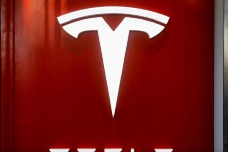 AMD and Tesla Lead Afternoon Market Cap Stock Movers on Friday By Investing.com