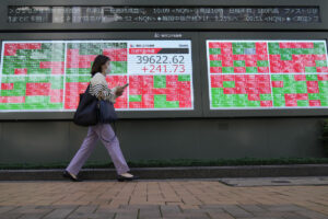 Stock market today: Asian shares are mostly higher after Wall St powers to more records