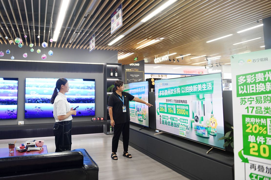 Consumers shop for home appliances at Suning's Fangyuanhui store in Renhuai, China, on September 12, 2024.