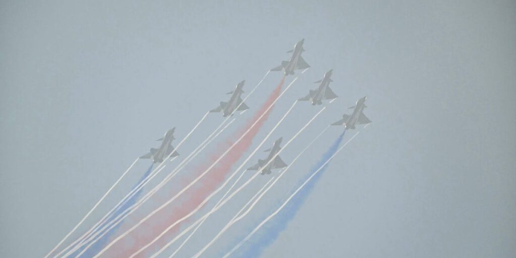 China’s big air show opened with a glitzy aerial display of its fighters, but crowds couldn’t see much in the smog