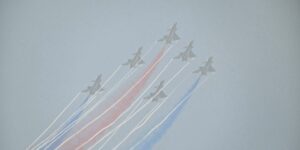 China’s big air show opened with a glitzy aerial display of its fighters, but crowds couldn’t see much in the smog